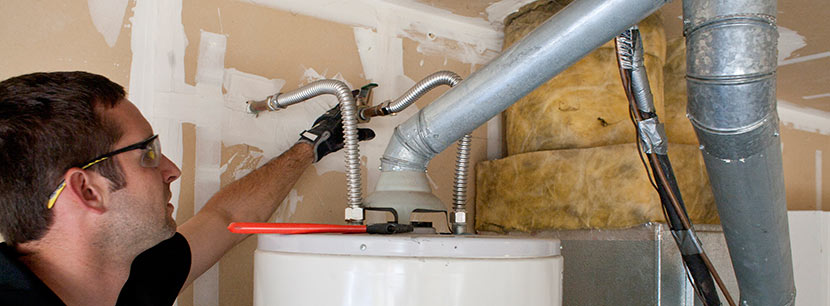Jack is one of our plumbers in Longmont, Colorado and he is fixing a water heater unit